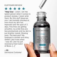 A close-up of a hand holding a blue and white Botox cosmetic vial, with a customer review text and star ratings overlaid on the top left. The background is a clean white.